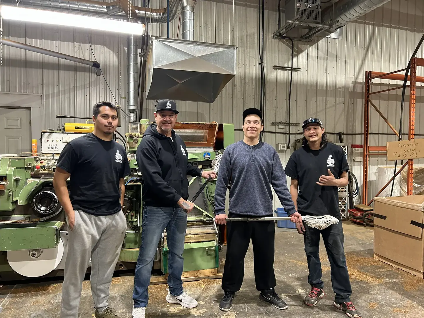 SixMiles team members in their manufacturing workshop